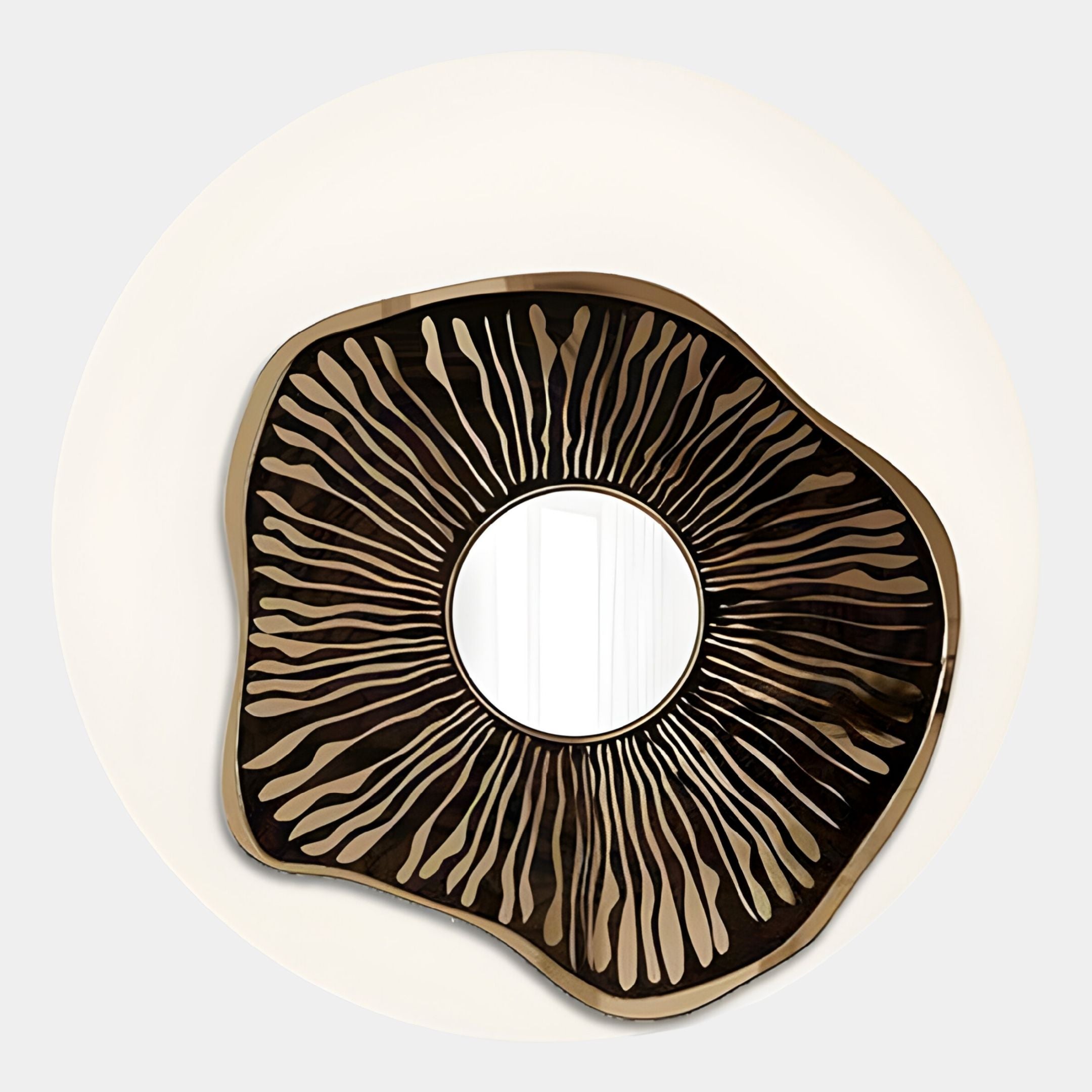 The Lunestre Bronze Ripple Organic Round Mirror 3D Wall Art by Giant Sculptures features a wavy, organic frame with radiating lines resembling sunrays or mushroom gills, creating dramatic wall art against a light background.