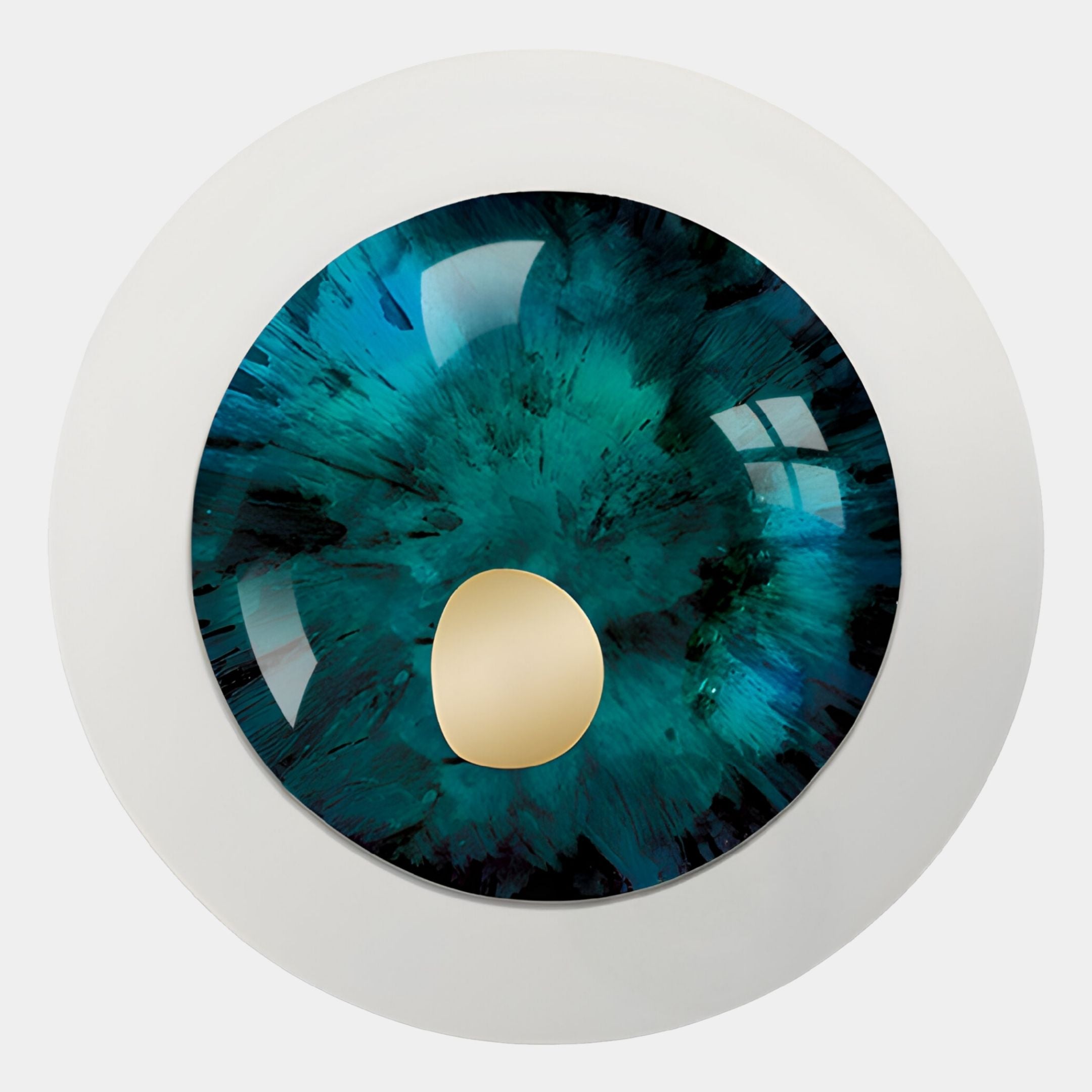 A close-up of a blue-green artificial eye with a reflective black center on white—perfect as Giant Sculptures' Iriselle Emerald Crystal Porcelain Round 3D Wall Art.