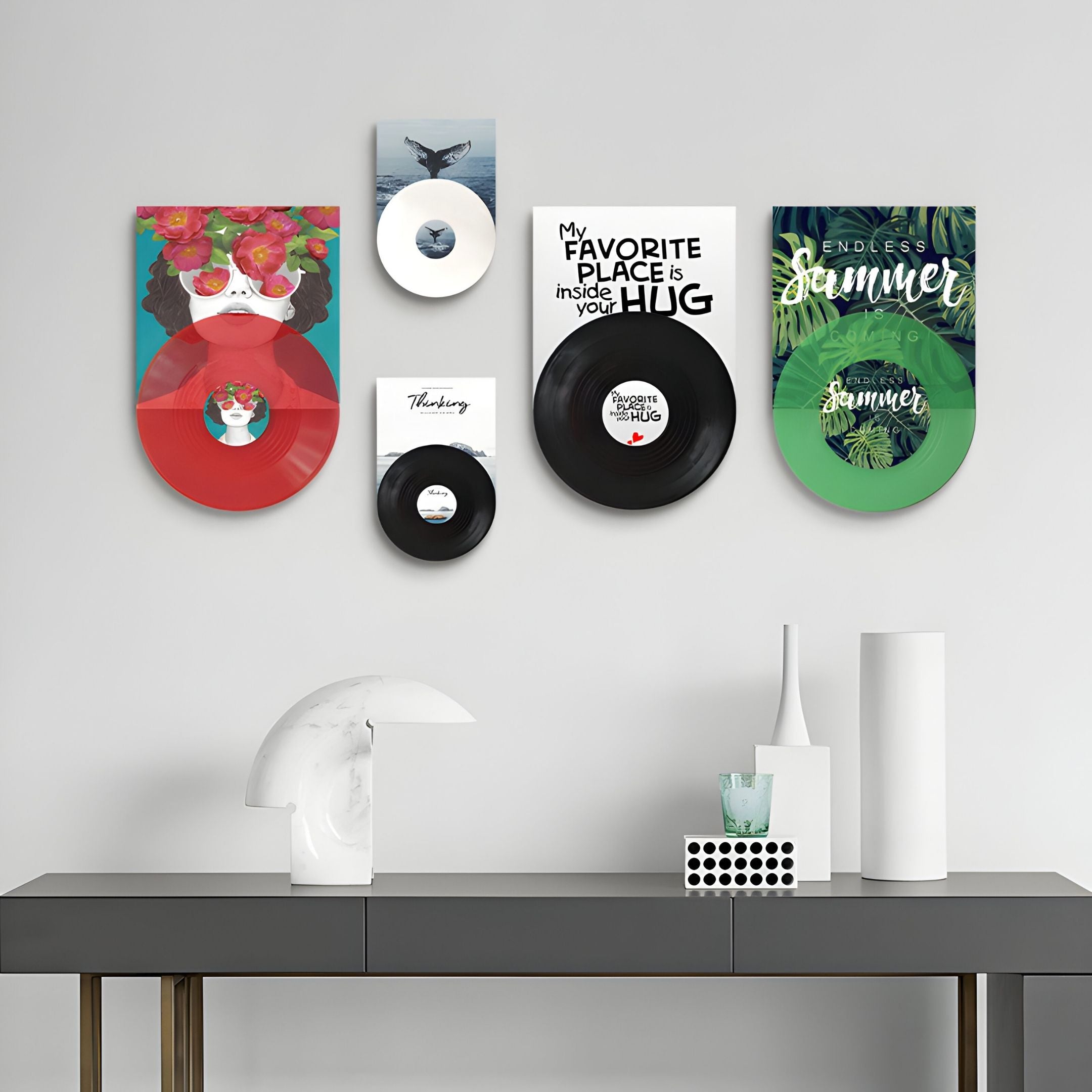 A modern room with a white console table and Groovepost Bloom & Summer Vinyl Record 5-Panel Wall Art by Giant Sculptures above it—abstract decor and vibrant covers create stunning, inspirational modern wall decor.