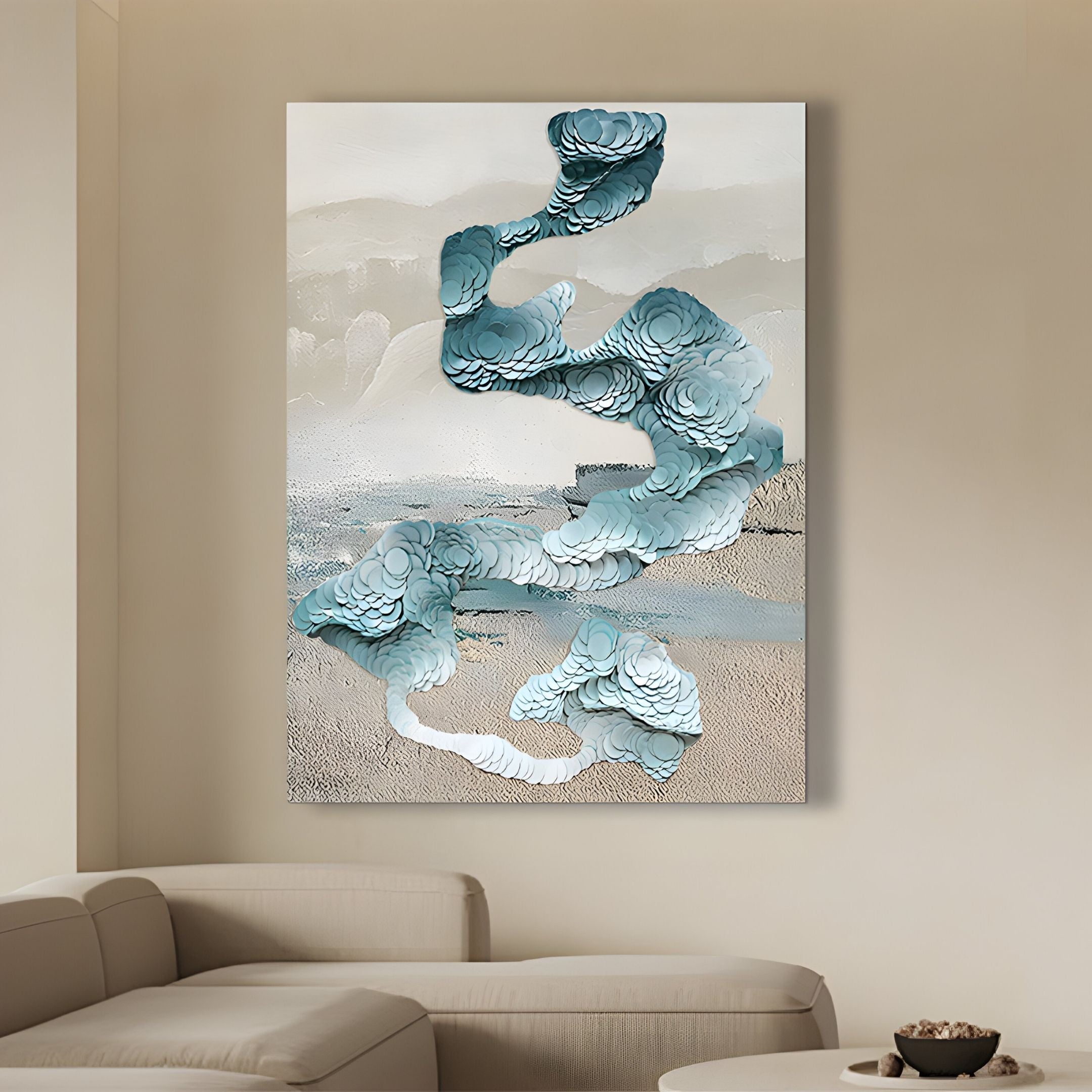 A modern living room with a light beige sofa and coffee table features Giant Sculptures' Aqualoom I Layered Leather Hand-Painted 3D Wall Art, showcasing blue and white swirls on a neutral, textured background.