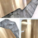 The Gildrift Gold Steel & Slate Grey Edge Textured 3D Wall Art by Giant Sculptures features textured gray concrete breaking through reflective gold steel, creating a bold contrast ideal for contemporary wall decor.