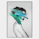 The Cavoya Brushstroke Muse Figurative Crystal Porcelain Wall Art by Giant Sculptures features a grayscale woman with curly hair, her eyes concealed by turquoise and green strokes for a striking, modern portrait effect.