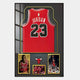 The Legends Michael Jordan #23 Bulls Jersey Framed Wall Art by Giant Sculptures features a red Bulls jersey, two Jordan photos, a Bulls logo, and dunk imagery—all NBA memorabilia on a black background.