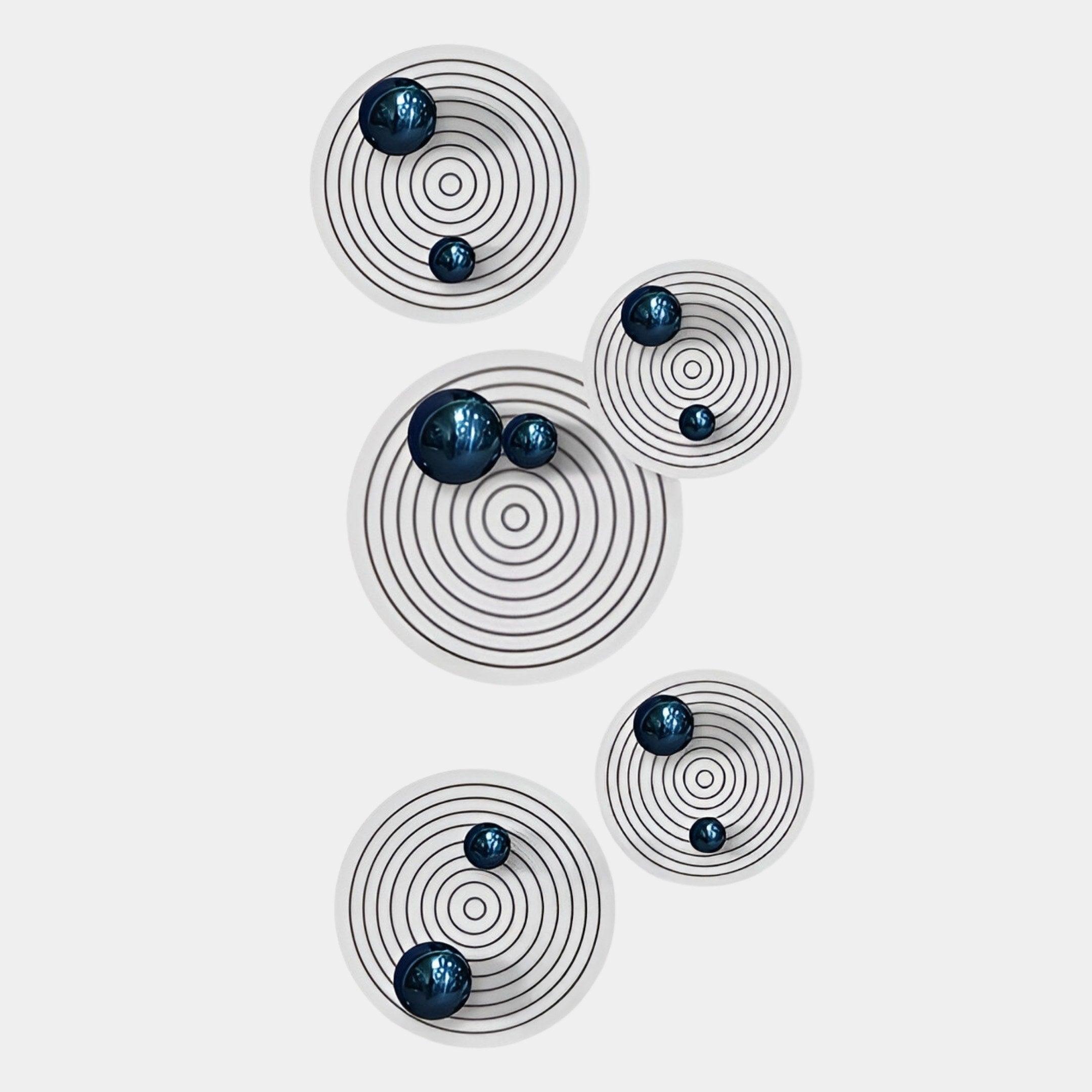 Giant Sculptures’ Orbiora Blue Orb 5-Panel Concentric Sphere 3D Wall Art features five white circular panels with black rings, each displaying glossy dark blue spheres in varying sizes for a bold, modern vertical display.