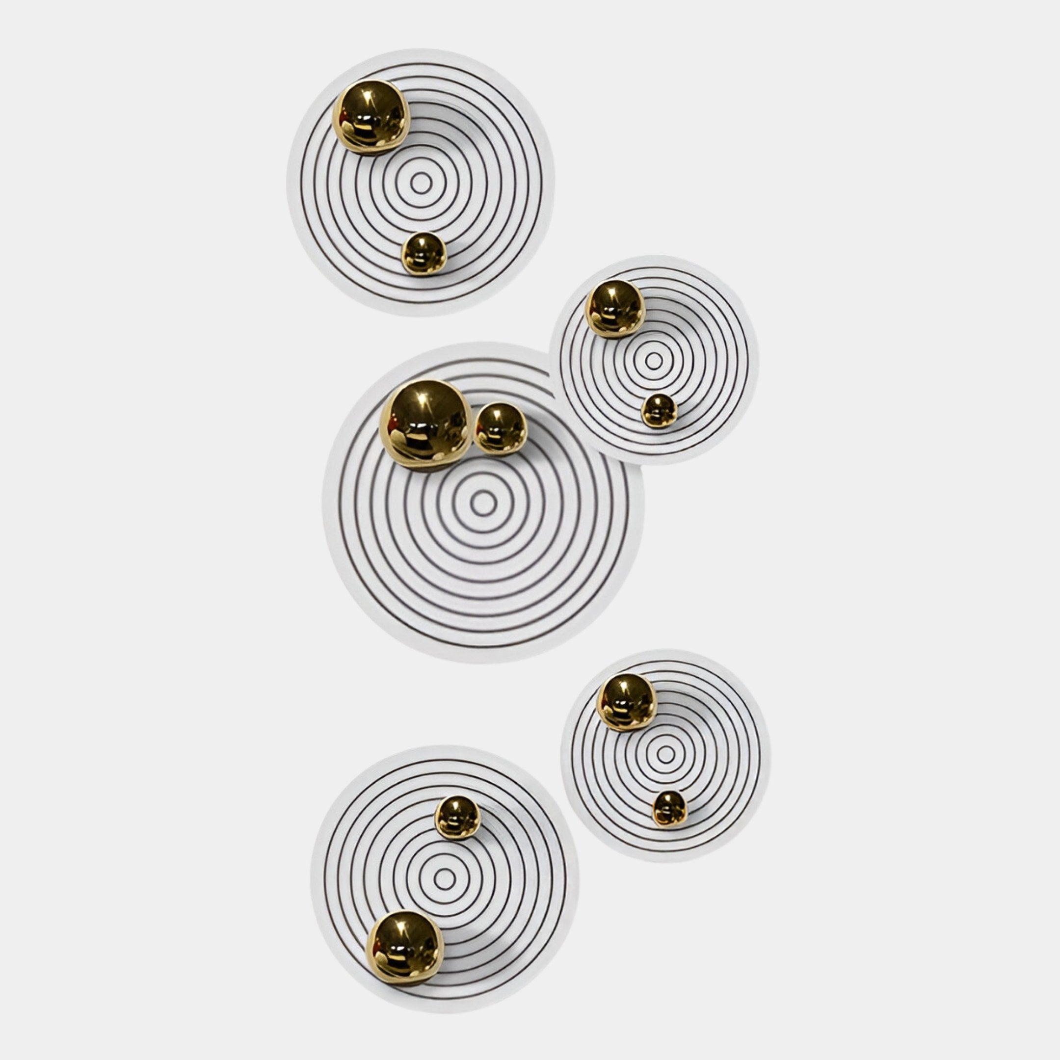 Six white circular plates with black concentric rings and gold spheres form the Orbiora Gold Orb 5-Panel Concentric Sphere 3D Wall Art by Giant Sculptures, creating a modern, abstract statement on a white background.