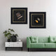 A modern living room features a light green sofa, a white side cabinet with plants and decor, and two Giant Sculptures Havantra Cutter & Torch Cigar Accessory Framed Wall Art pieces displayed above.