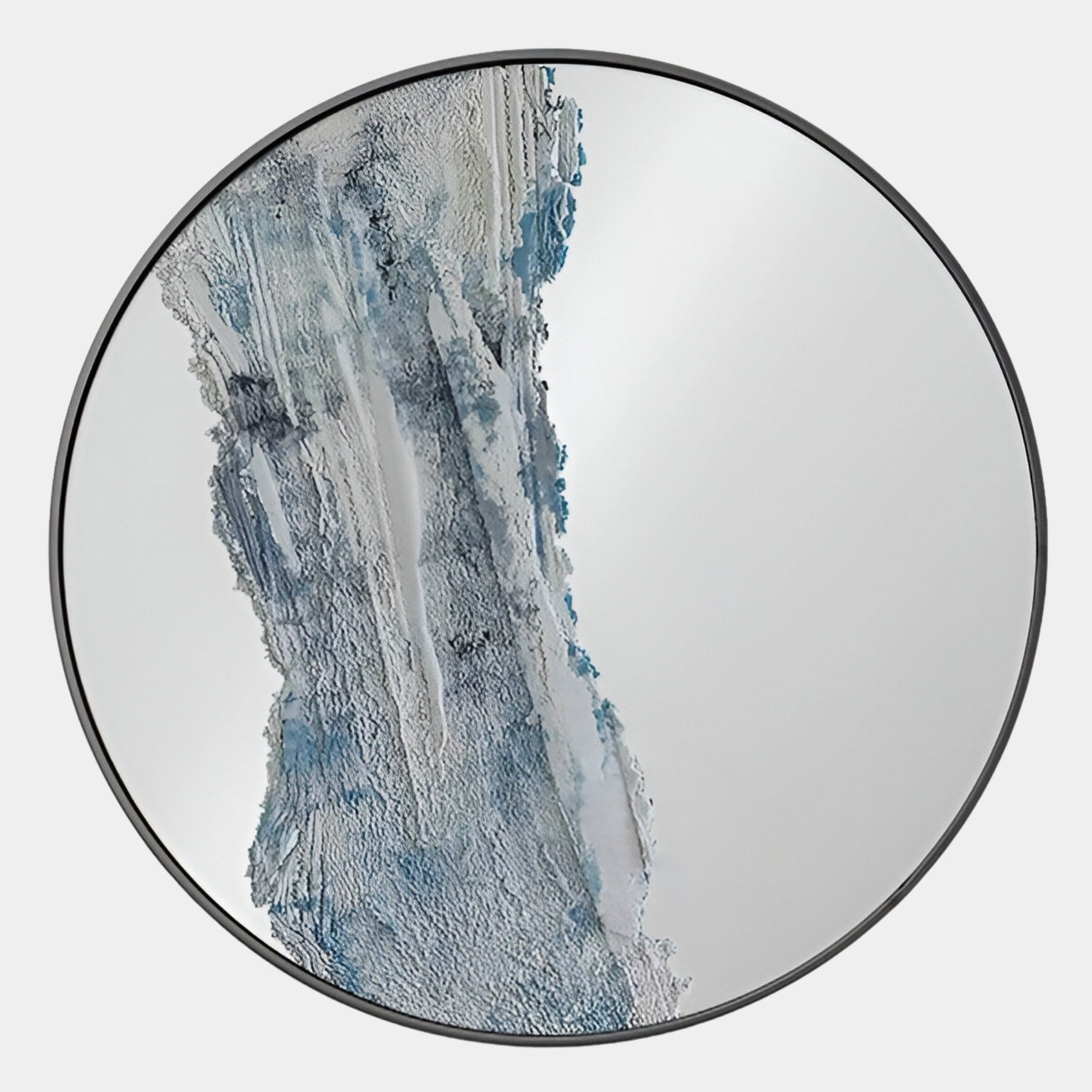 The Erosian Silver Cascade Textured Round Mirror 3D Wall Art by Giant Sculptures features a thin black frame and an abstract blue and gray design cascading down the surface, creating a striking textured effect.