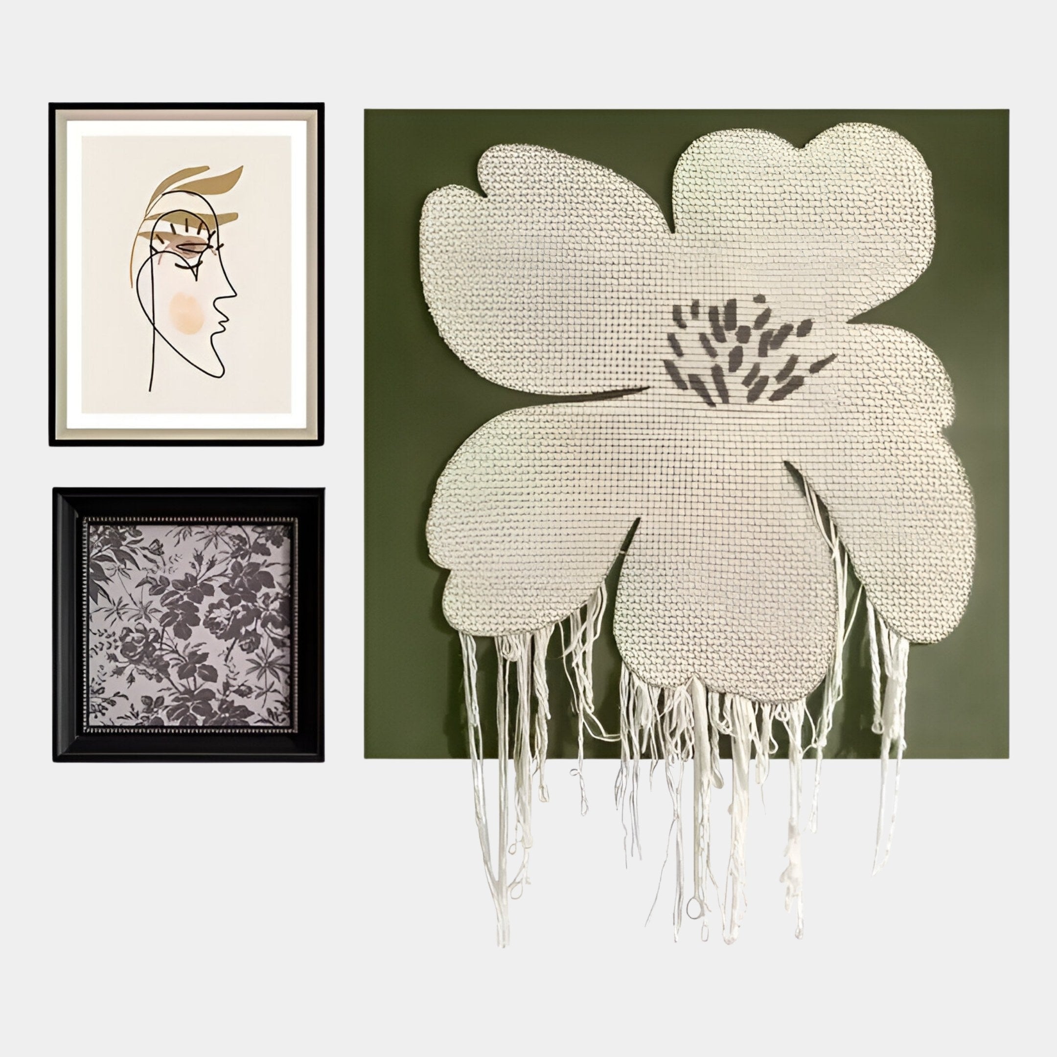 The Florayne 3-Set Ivory Woven Textured 3D Wall Art by Giant Sculptures features a minimalist face, black-and-white floral print, and large yarn-detailed flower on green—perfect contemporary wall decor for light backgrounds.