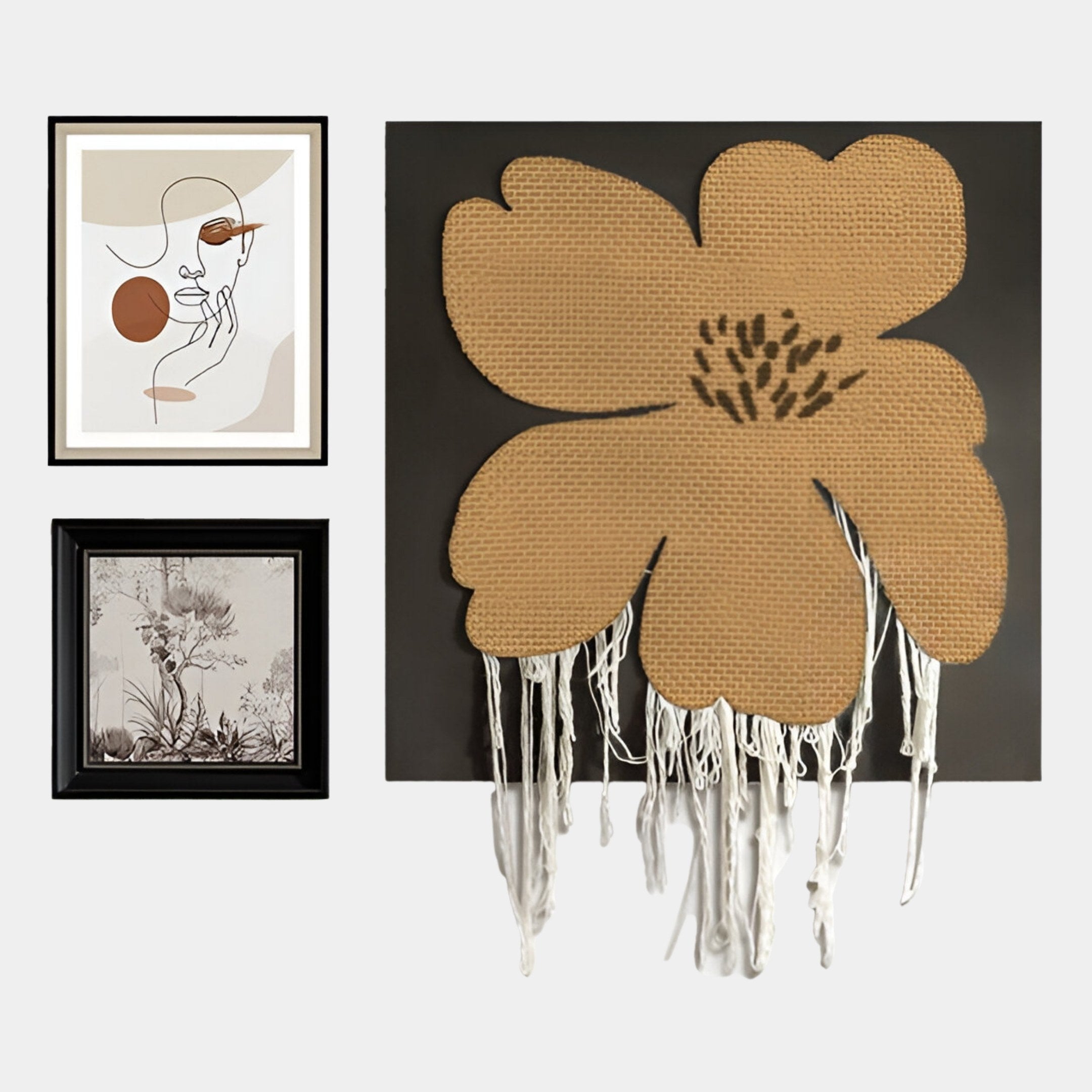 The Florayne 3-Set Ochre Woven Textured 3D Wall Art by Giant Sculptures includes a line-drawn face with geometric shapes, a black and white floral print, and a textured woven flower with hanging threads on a dark background.