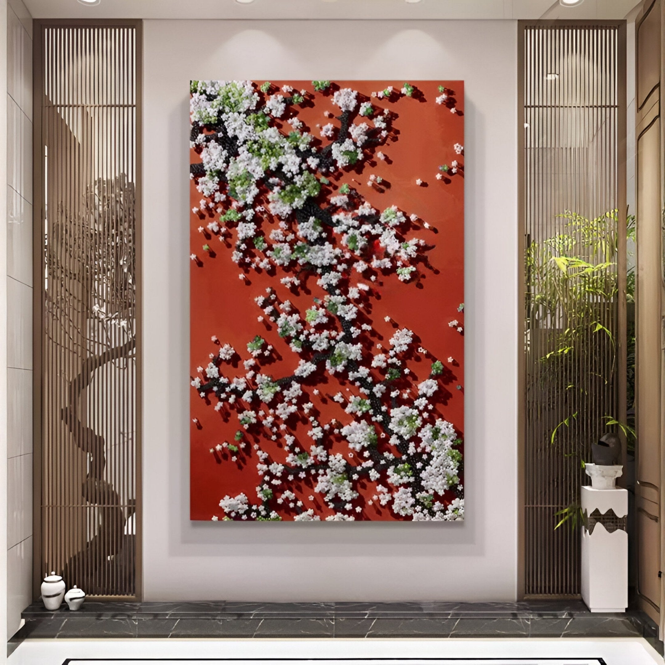 The Florivine Crimson Blossom Tree Button 3D Wall Art by Giant Sculptures hangs in a modern hallway, displaying white and pink blossoms with green leaves on a crimson background, complemented by decorative panels and potted plants.