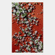 Aerial view of white and green flowering trees casting long shadows on a vibrant crimson ground, evoking the Florivine Crimson Blossom Tree Button 3D Wall Art by Giant Sculptures.