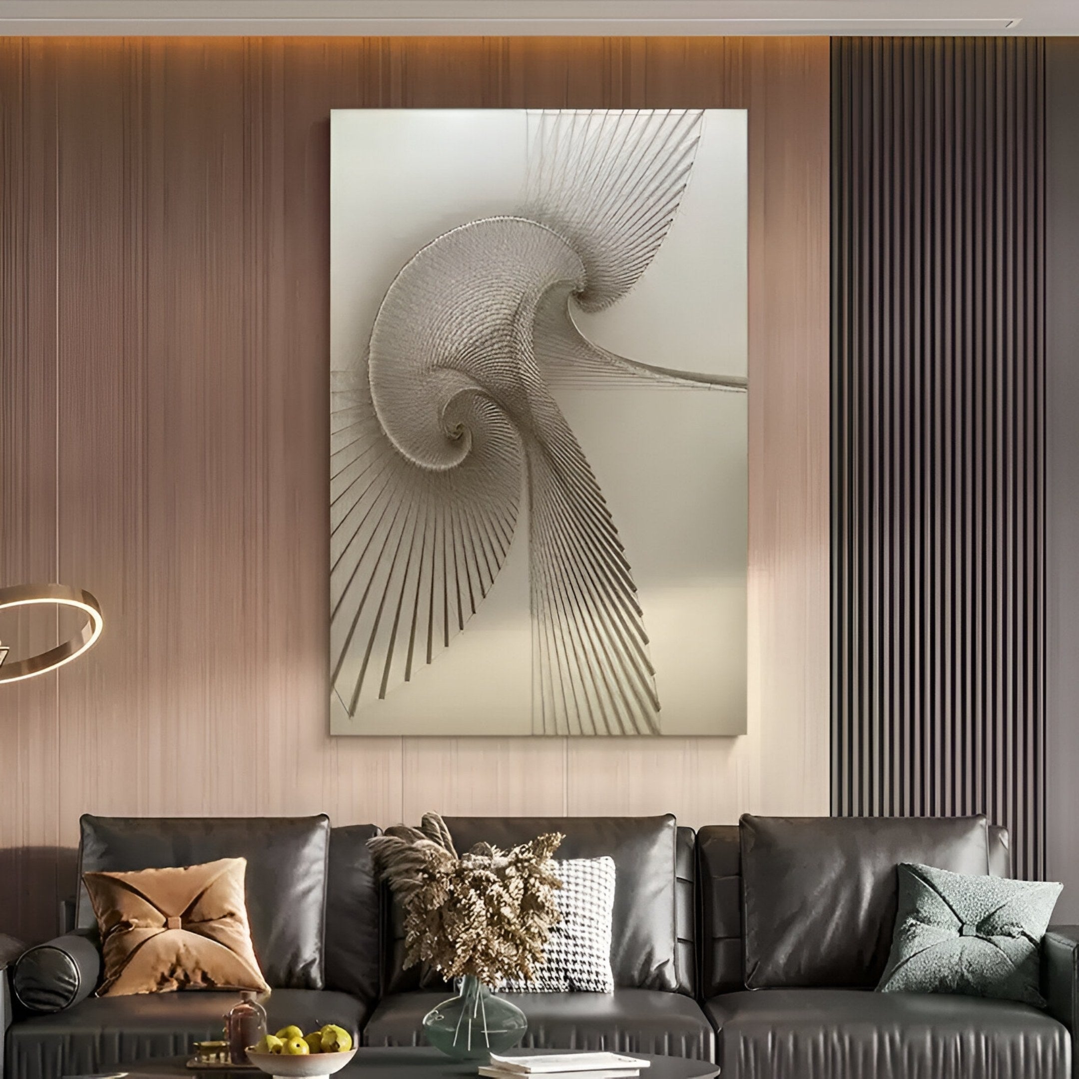 A modern living room with a black leather sofa, neutral pillows, and a glass coffee table with dried flowers features Giant Sculptures' Spiralis Natural String Abstract Lines Swirl 3D Wall Art on a wood-paneled wall.