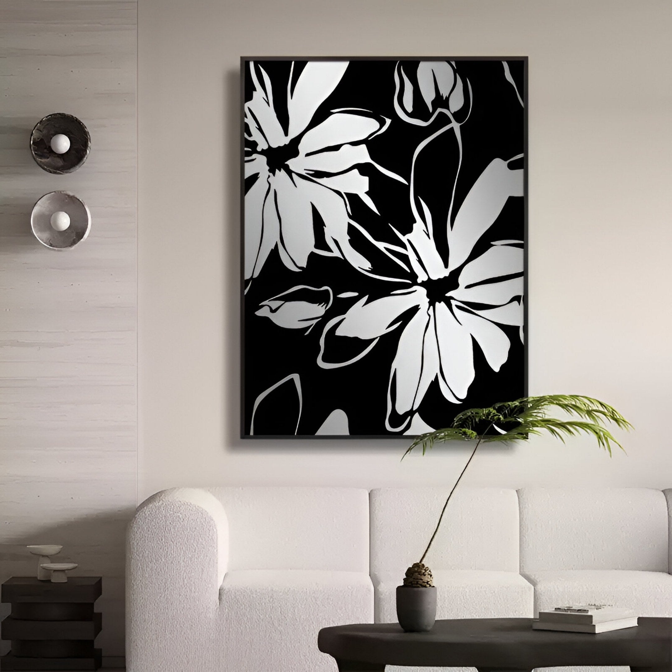 A modern living room features a white sofa, a small table with a plant, and the Floristra III Petal Bloom Silver Mirror 3D Wall Art by Giant Sculptures above the couch. Two round decorative mirrors on the left add depth and contemporary flair.