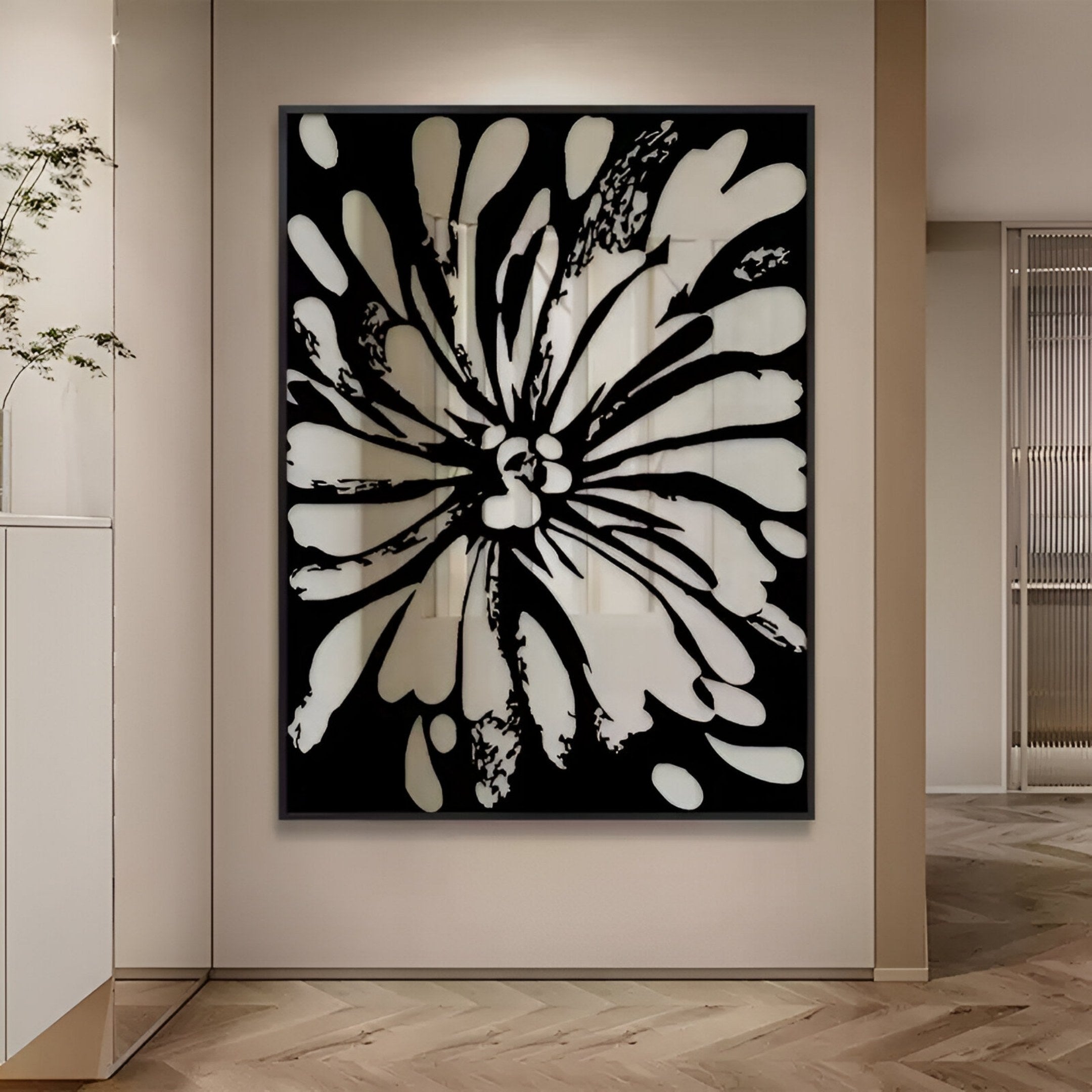 The Floristra IV Petal Bloom Silver Mirror 3D Wall Art by Giant Sculptures, featuring bold petal-like shapes, is showcased on a beige wall with modern decor in a minimalist interior with wooden floors.