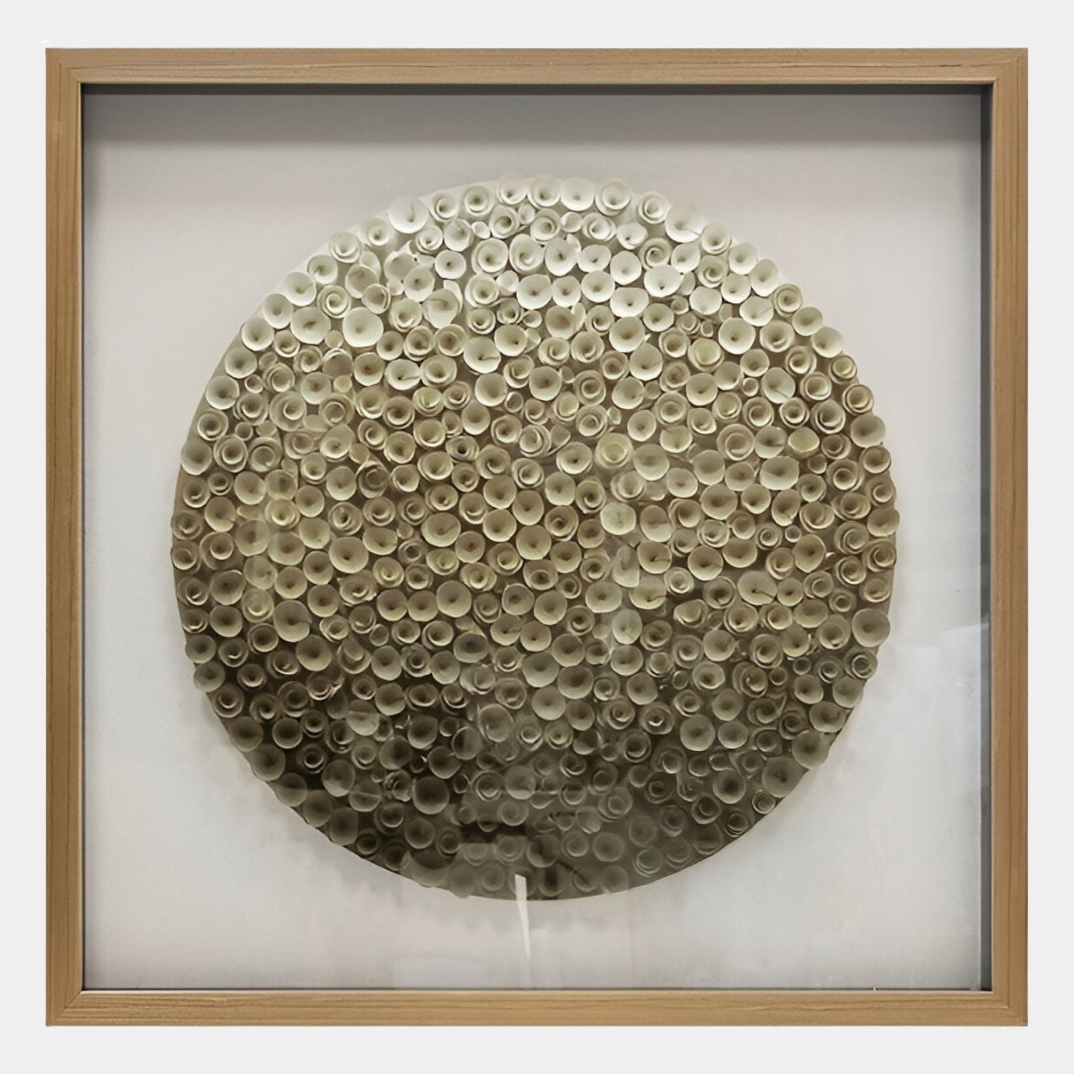 The Aureliare Pearl Gold Rolled Floral Framed 3D Wall Art by Giant Sculptures features cream and beige rolled tube shapes in a textured floral design within a square light wooden frame—ideal modern decor for living rooms with white walls.
