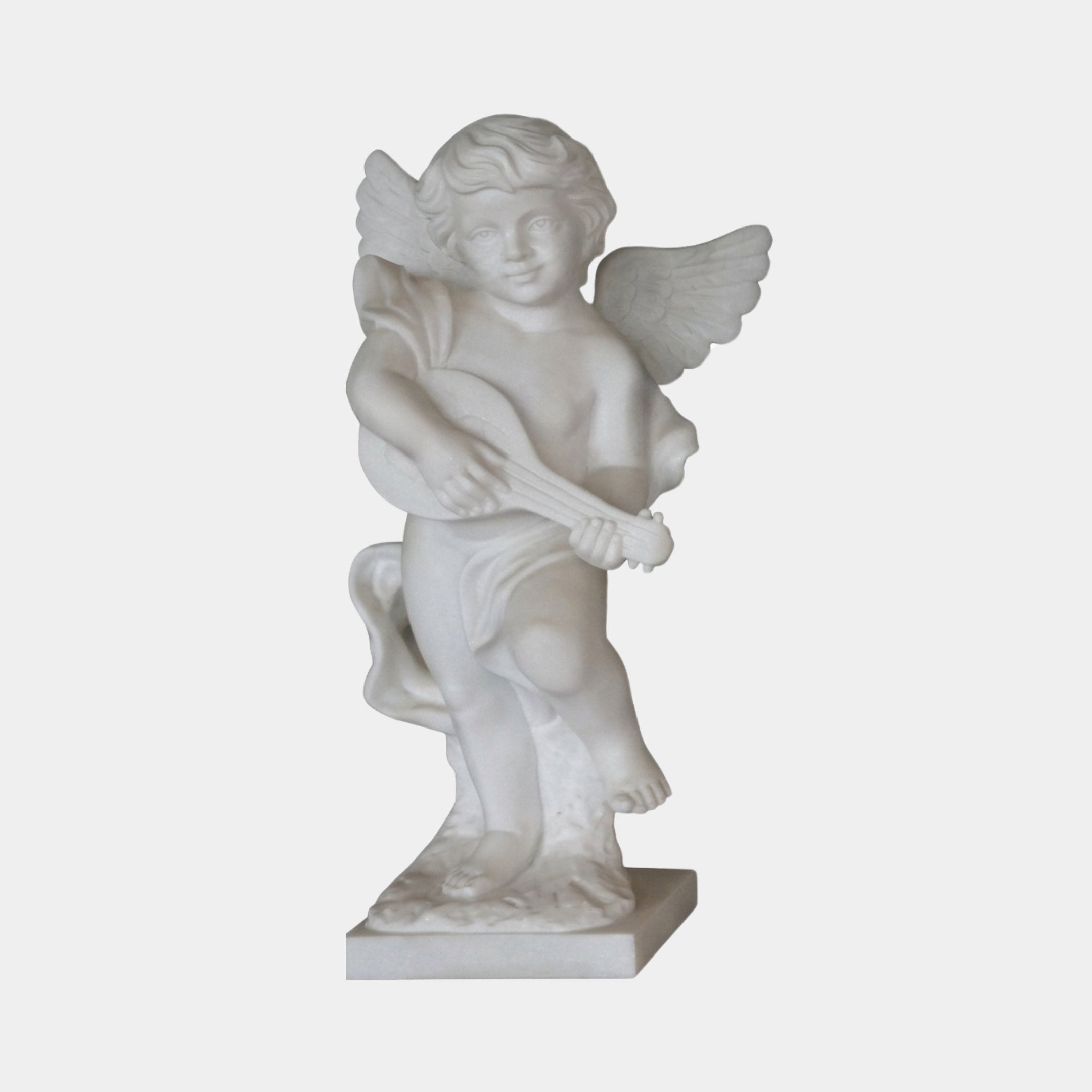 Little Angels Marble Outdoor Sculpture – 80cm by Giant Sculptures, a winged cherub playing a stringed instrument, carved in white marble with detailed curly hair and feathered wings, on a square base against a plain light grey background.
