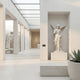 Large Angel Marble Outdoor Sculpture by Giant Sculptures, 180cm white marble winged figure with hand raised in blessing, displayed on a pedestal in a sunlit gallery niche.