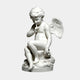 Cupid God Of Love Angel Marble Outdoor Sculpture in white marble, seated on a naturalistic base with finger raised to lips and detailed wings, on a plain grey background.