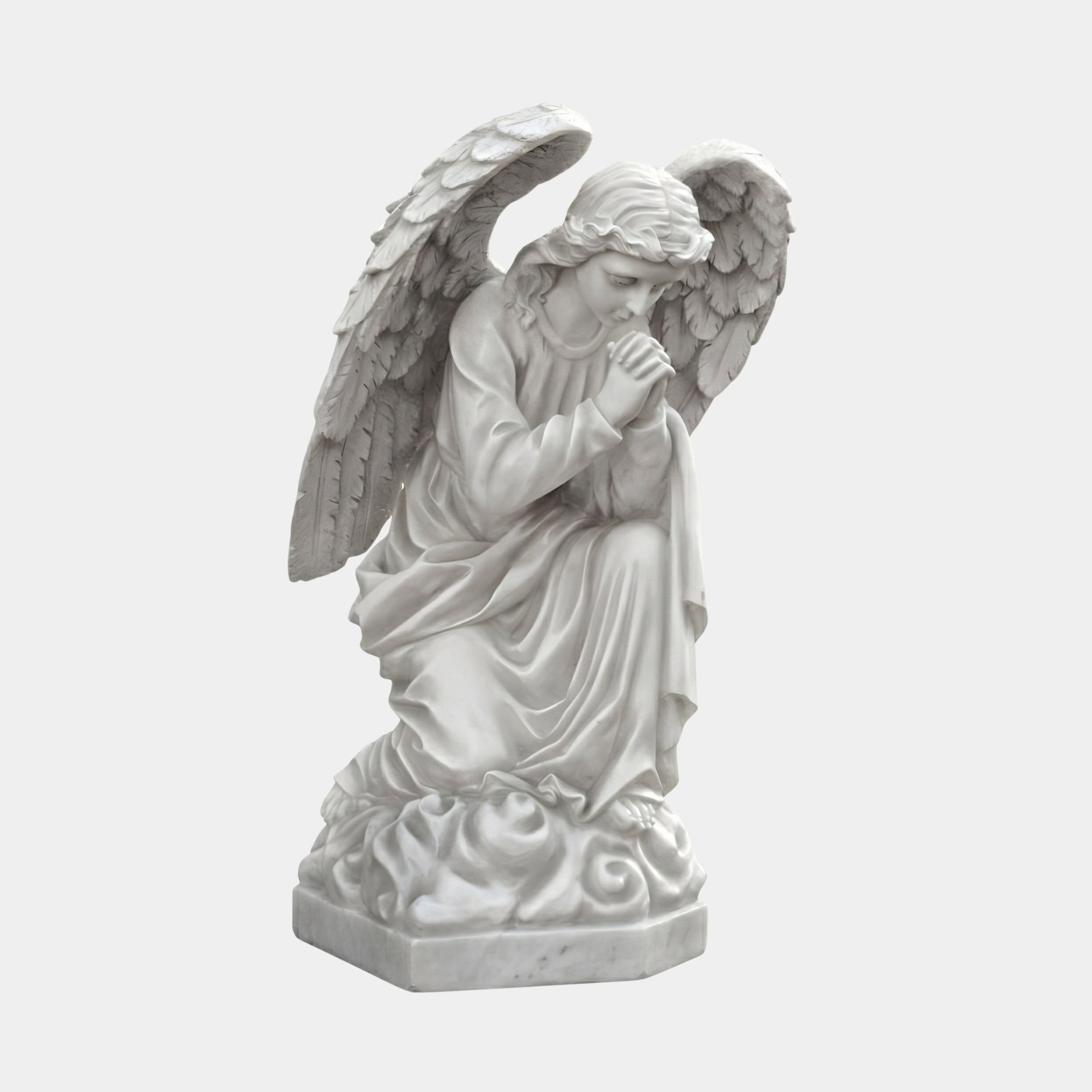 Woman Angel Marble Outdoor Sculpture - 100cm by Giant Sculptures, a kneeling angel in flowing robes with outstretched feathered wings and hands clasped in prayer, carved in natural white marble on a hexagonal base, shown against a light grey background.