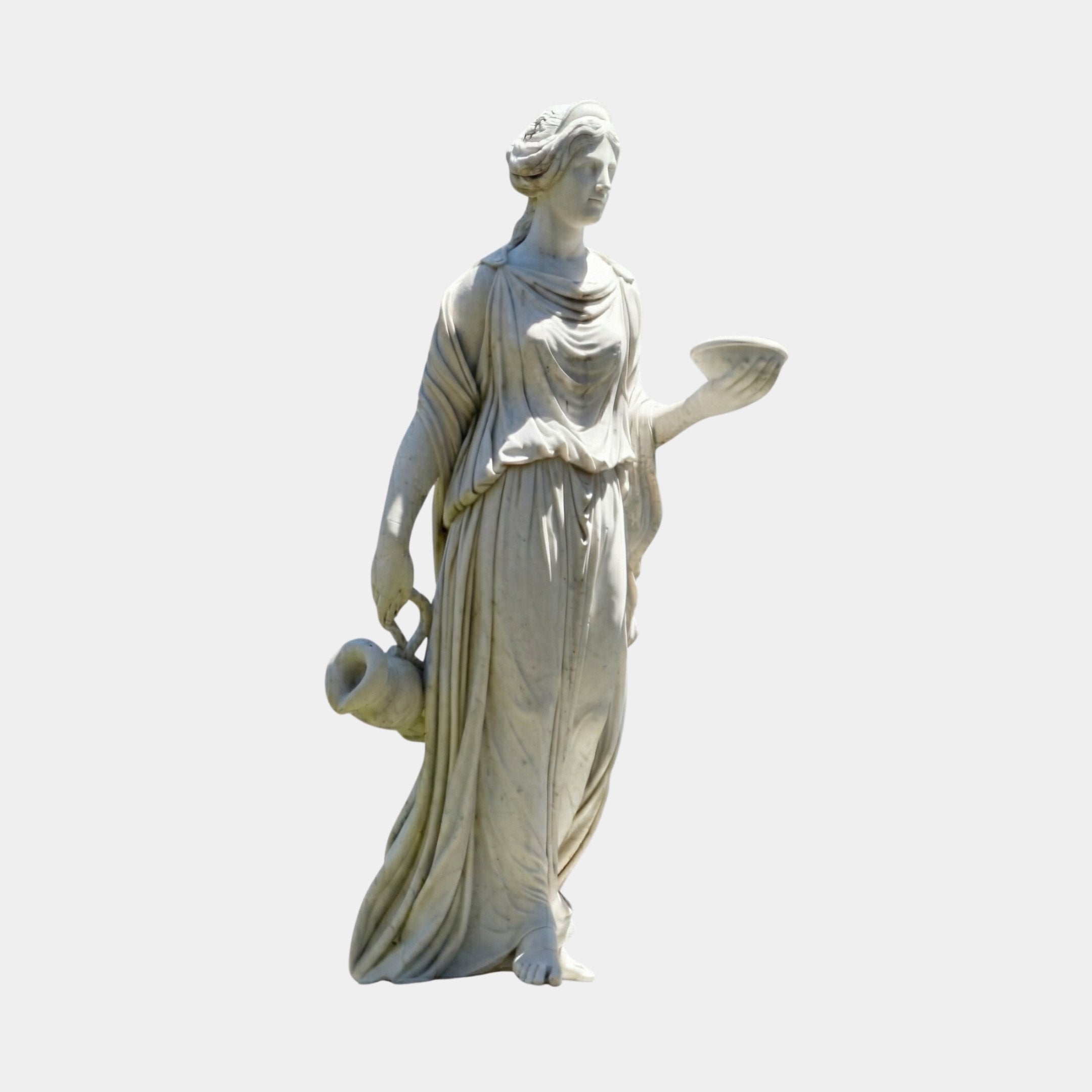 Hebe Cupbearer Angel Marble Outdoor Sculpture in white natural marble, depicting Hebe in flowing draped robes holding a cup and pitcher in contrapposto pose, on a plain light background.