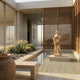 Four Season Female Angel Marble Outdoor Sculpture in warm golden two-tone marble standing in a shallow water feature within a modern courtyard with wooden louvres and desert plants.