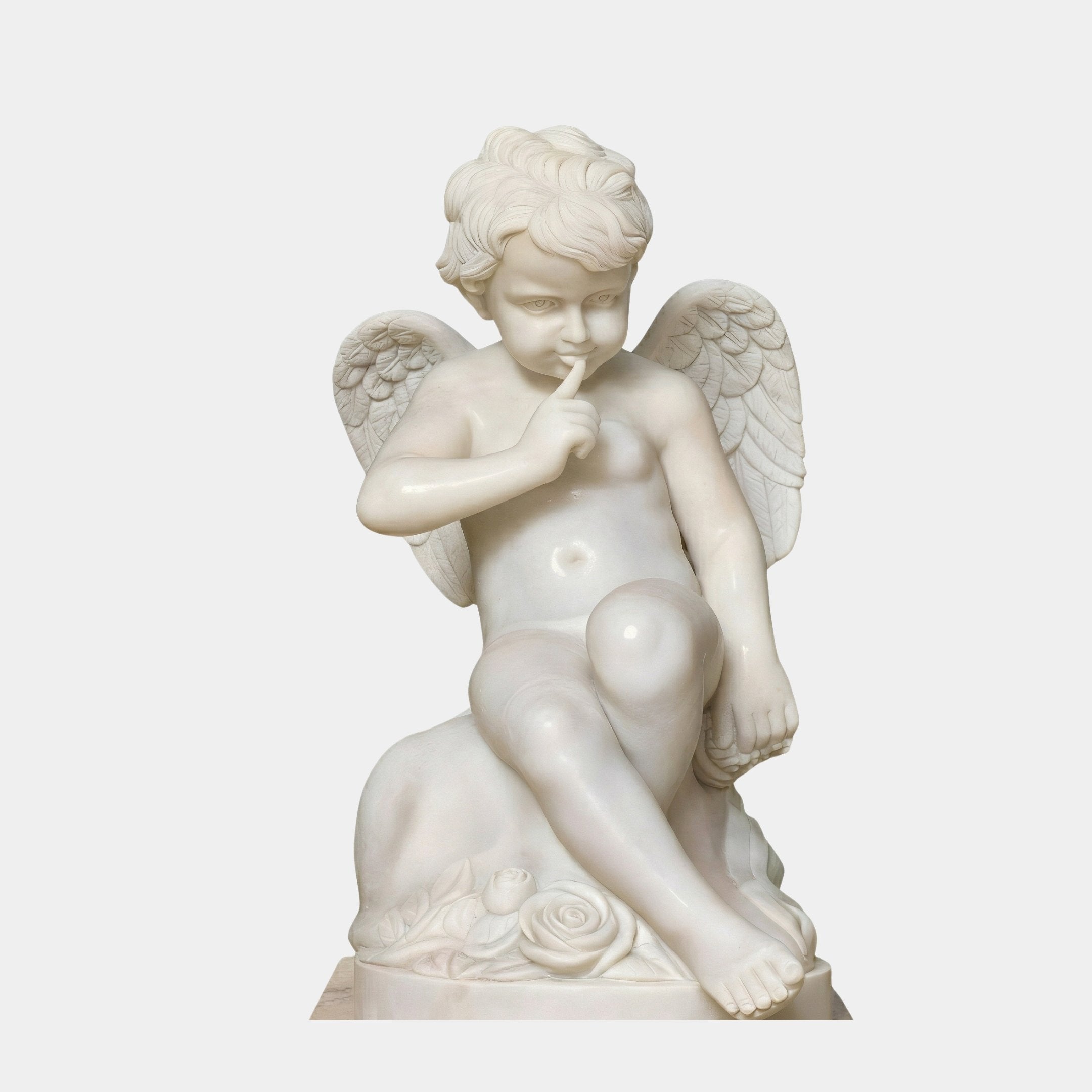 Baby Angel Marble Outdoor Sculpture – 80cm by Giant Sculptures, white marble cherub seated with finger to lips and small wings, roses carved at the base, on a plain light background.