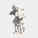 The Little Angel Angel Marble Outdoor Sculpture (60cm) by Giant Sculptures features a smiling cherub with wings, draped garment, and a scroll, crafted in white marble against a plain light background.