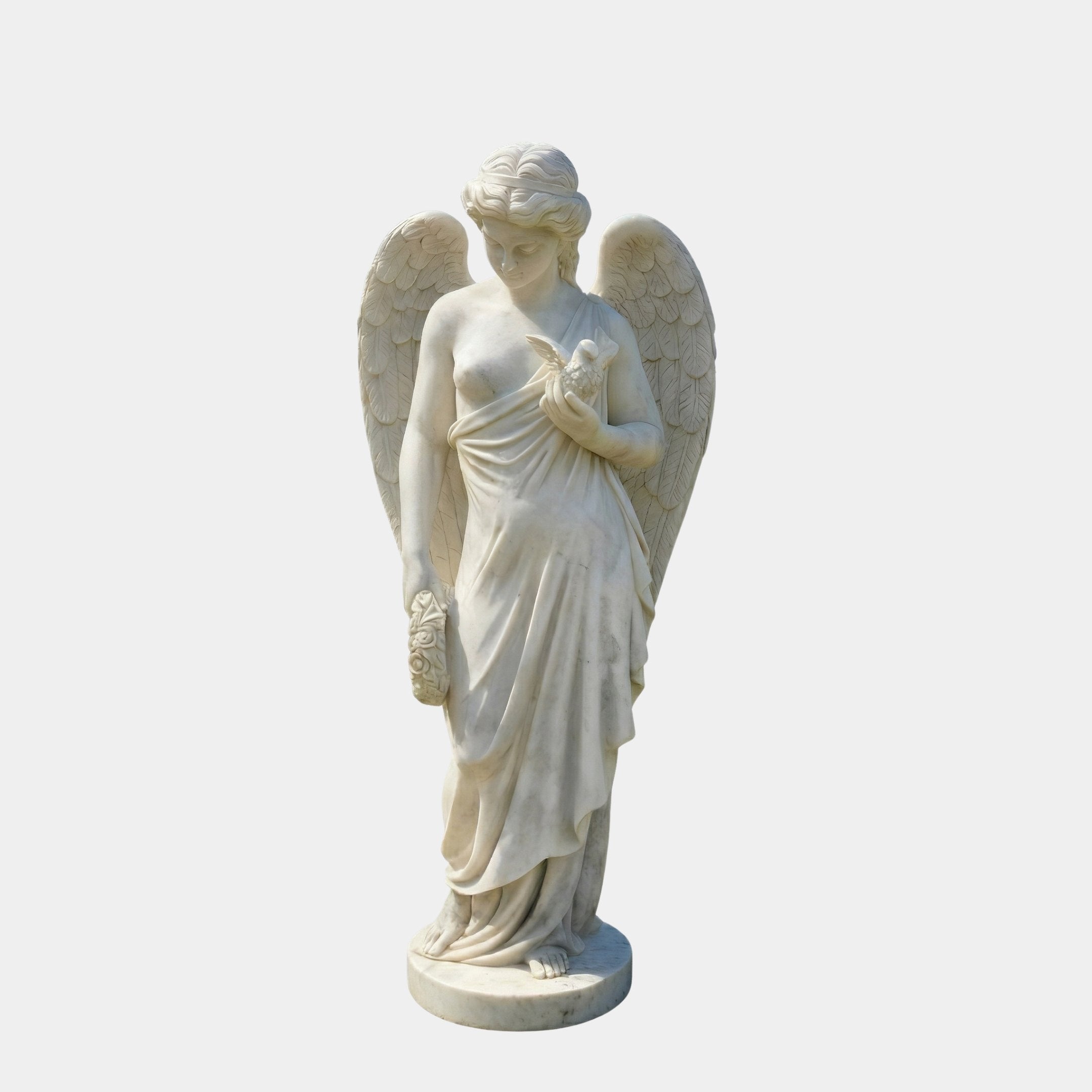 Winged Angel Marble Outdoor Sculpture by Giant Sculptures, 160cm robed female figure cradling a small bird, with detailed feathered wings, on a round marble base.