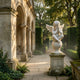 Cherub V5 Angel Marble Outdoor Sculpture by Giant Sculptures, an 80cm hand-carved white marble cherub seated on a sphere atop a stone pedestal in a sunlit garden with arched colonnade.