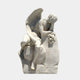 Weeping Angel Marble Outdoor Sculpture by Giant Sculptures, depicting a winged angel hunched in grief with one hand covering its face and flowers in the other, carved in white marble against a light background.