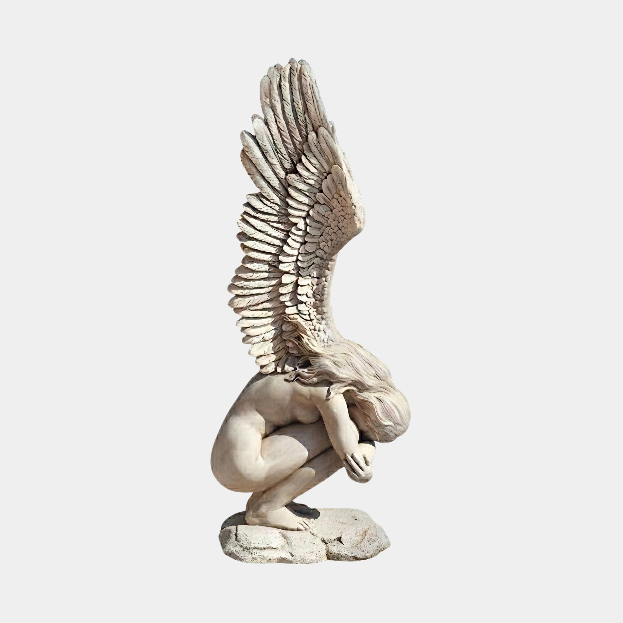 Weeping Angel Marble Outdoor Sculpture by Giant Sculptures, depicting a crouching winged figure on a rock base with head bowed and large feathered wings raised, in white marble, 150cm, on a plain light background.
