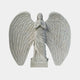 Angel With Large Wings marble outdoor sculpture by Giant Sculptures, depicting a praying female angel in classical robes with wide-spread feathered wings on a square base, against a plain light background.