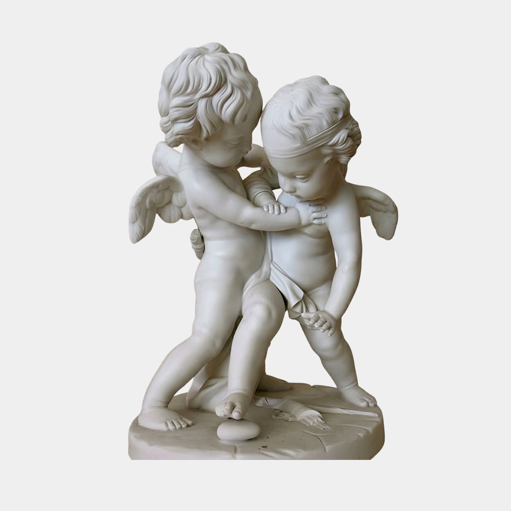 Cupid Angel Marble Outdoor Sculpture – 80cm by Giant Sculptures, depicting two winged cherubs wrestling playfully, carved in white marble with detailed curly hair and wings, on a plain light background.