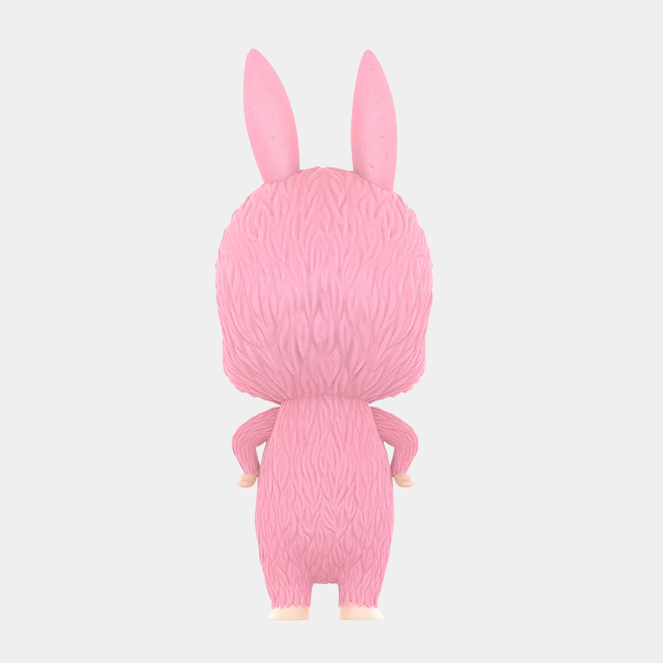 A pink, furry, bunny-eared figure stands with its back to the viewer, arms bent and hands on hips. The Monster Mega Labubu Sculpture - 160cm by Giant Sculptures features lifelike faux-fur texture against a plain white background.