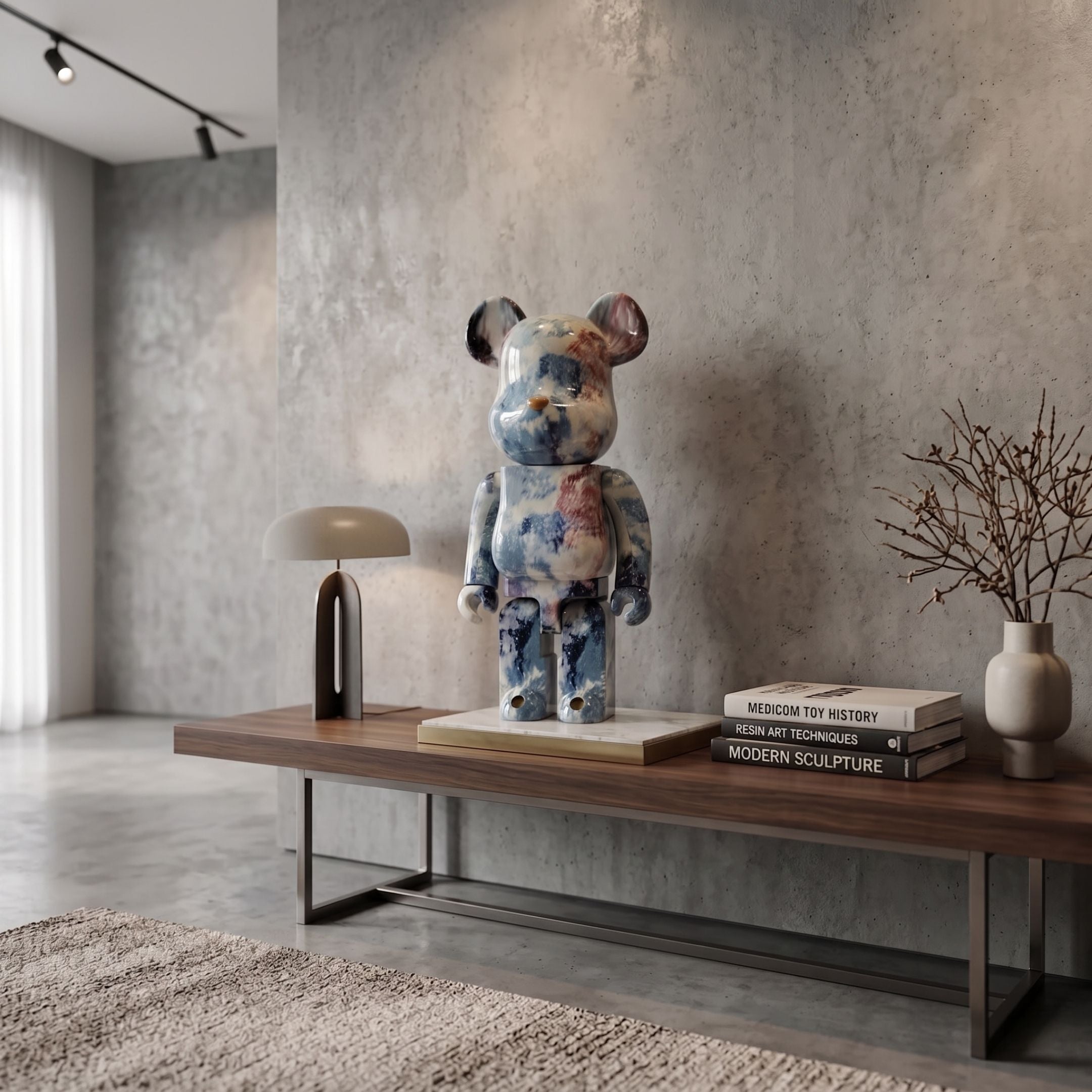 Mistbound Tie-Dye Bear Sculpture, 70cm, glossy blue, white, and red marbled resin bear on a console table beside books and a vase in a modern living room.