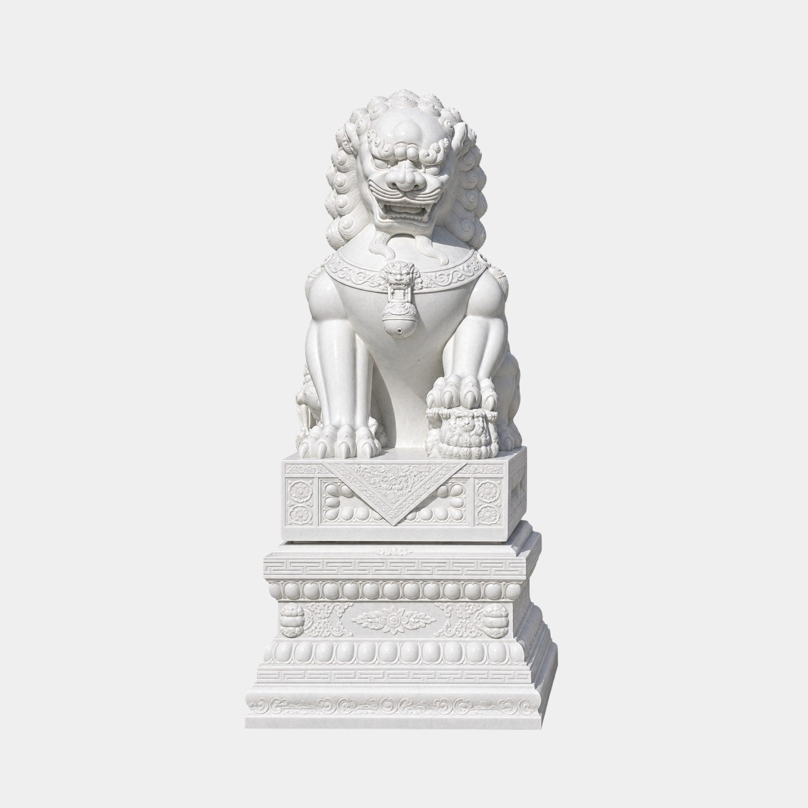 White marble guardian lion seated with a forepaw on a cub, on a carved plinth