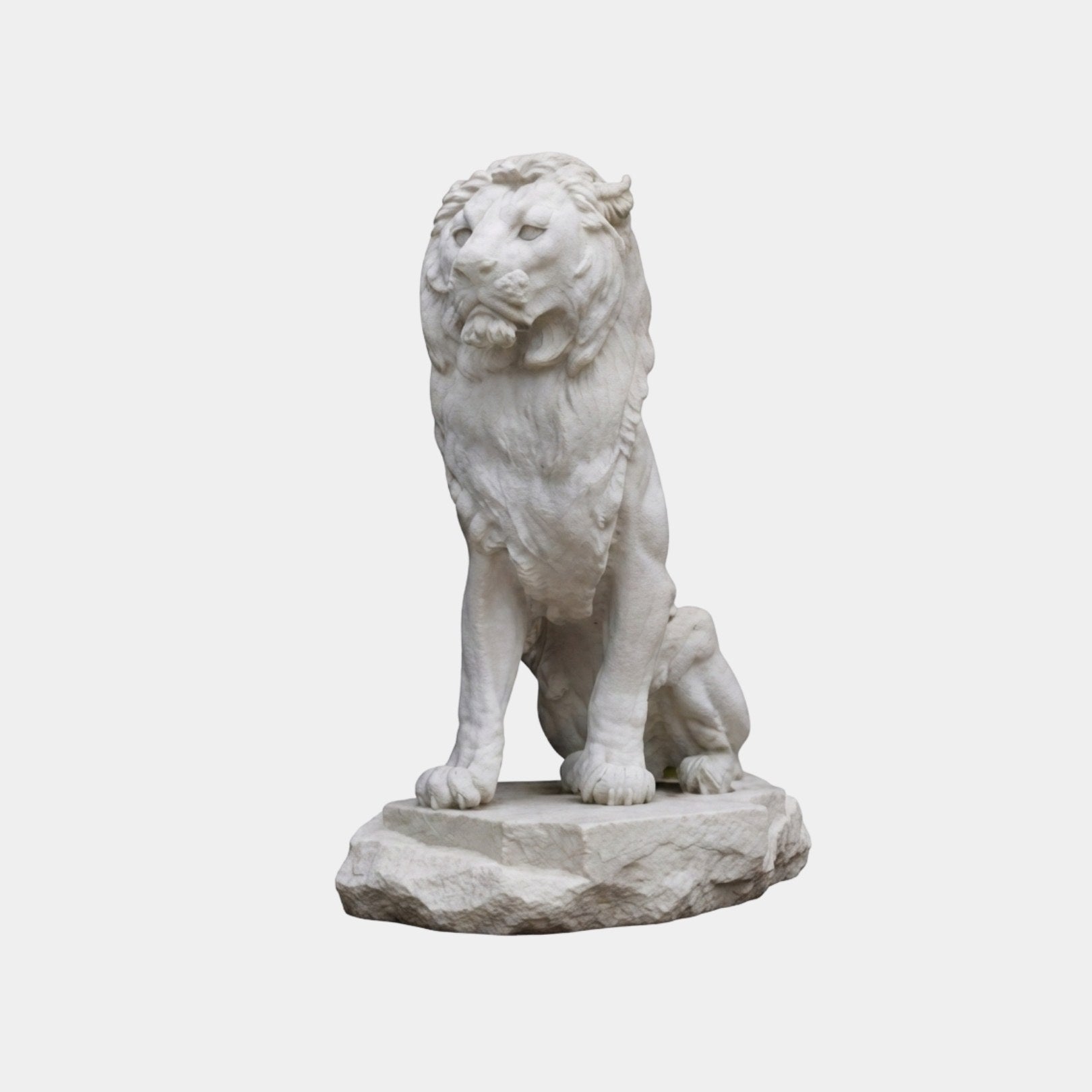 White marble lion sitting on its haunches on a rough rock-hewn boulder base, 120cm