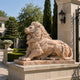 Pink marble lion couchant and roaring on its matching slab at a gateway