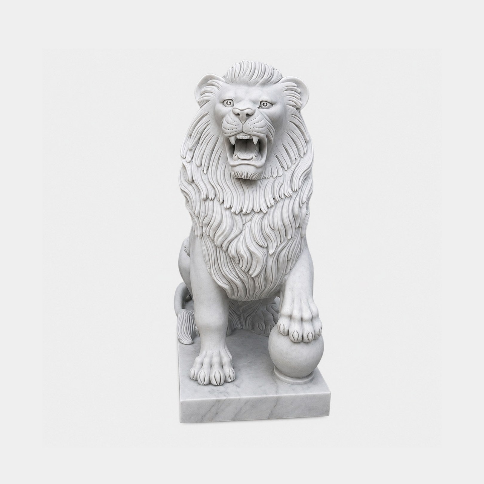 White marble lion seated frontally with one forepaw resting on a sphere