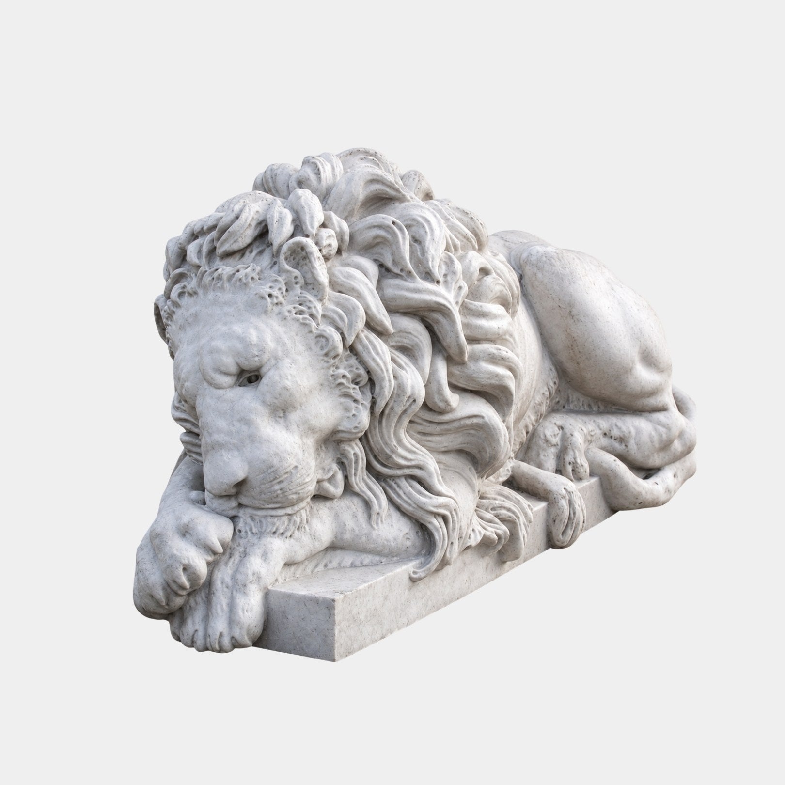 White marble lion asleep with its head resting on crossed forepaws
