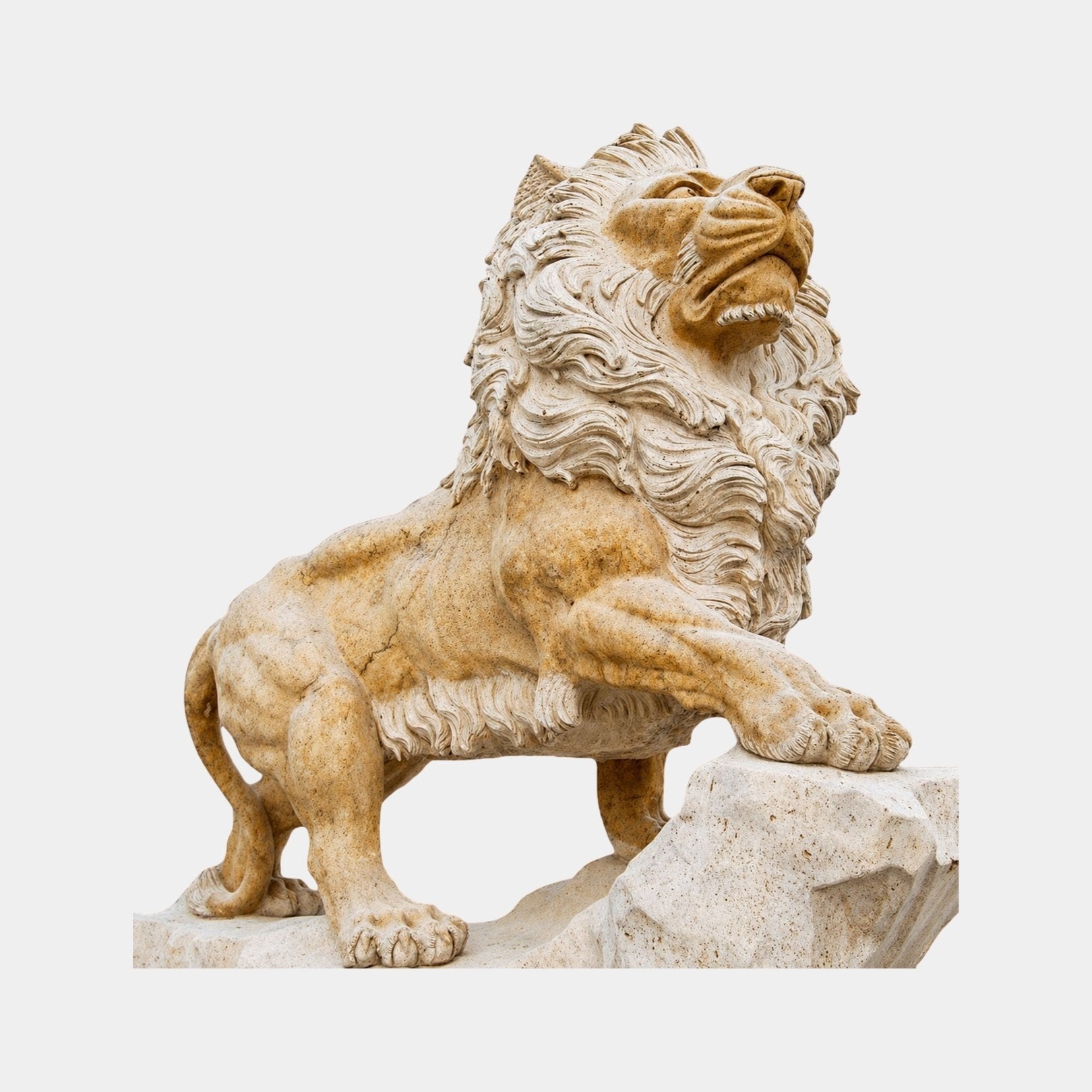 Beige stone lion standing with head raised and turned up, forepaw on a rock