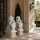 White marble heraldic lion holding a crowned cartouche upright