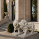 The two standing marble lions on their own slabs beside stone steps