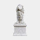 White marble lion standing on a tall moulded pedestal, jaws open and head turned