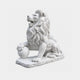 White marble lion seated with head lifted and turned, forepaw on a sphere