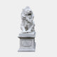 White marble lion seated roaring on a moulded pedestal with a recessed panel