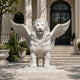 White marble winged lion standing with both wings spread wide