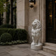 White marble lion standing with a lobed mane on its round base