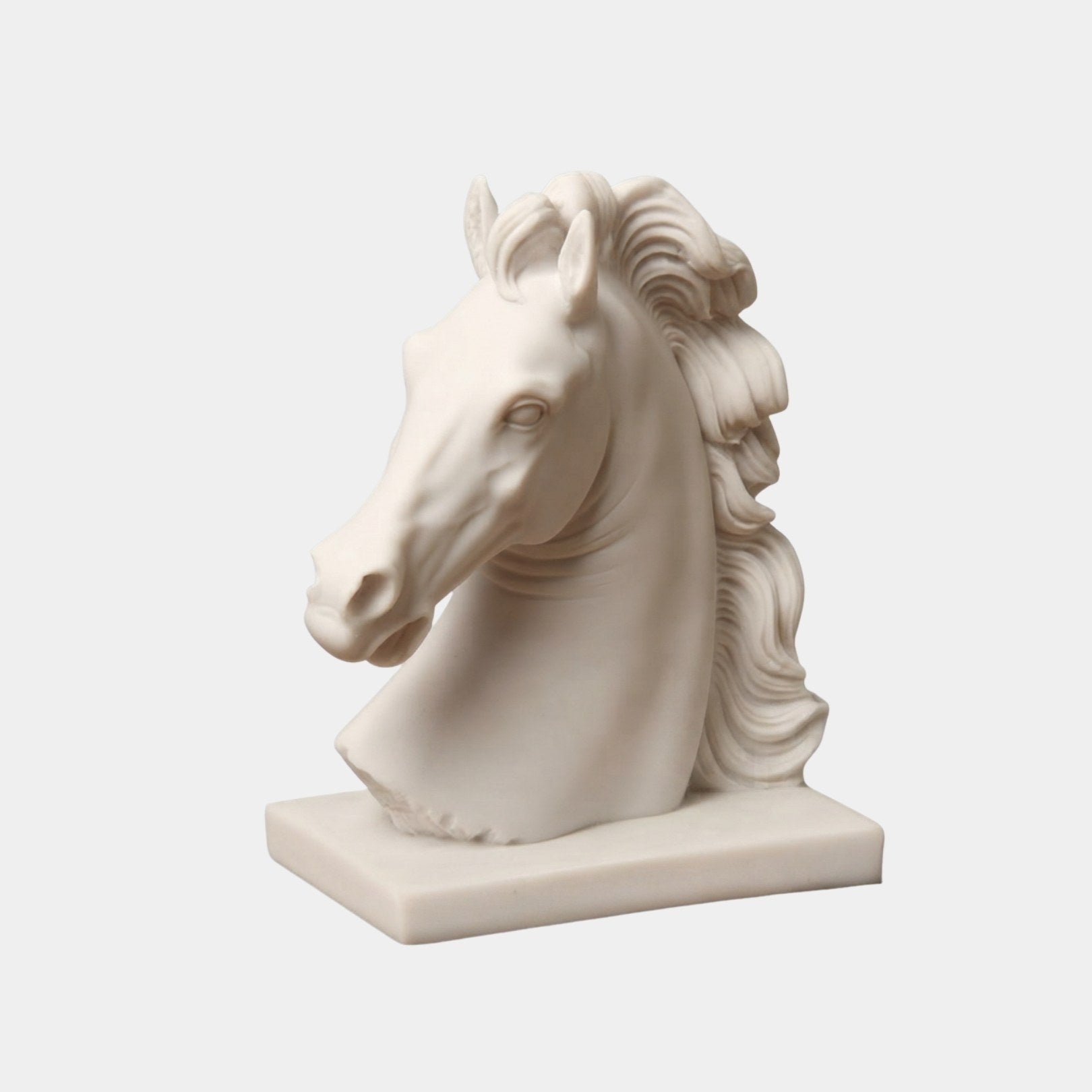 Marble horse head with a long flowing mane on a thin rectangular base