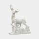 White marble stag with three smaller deer grouped around it on one slab